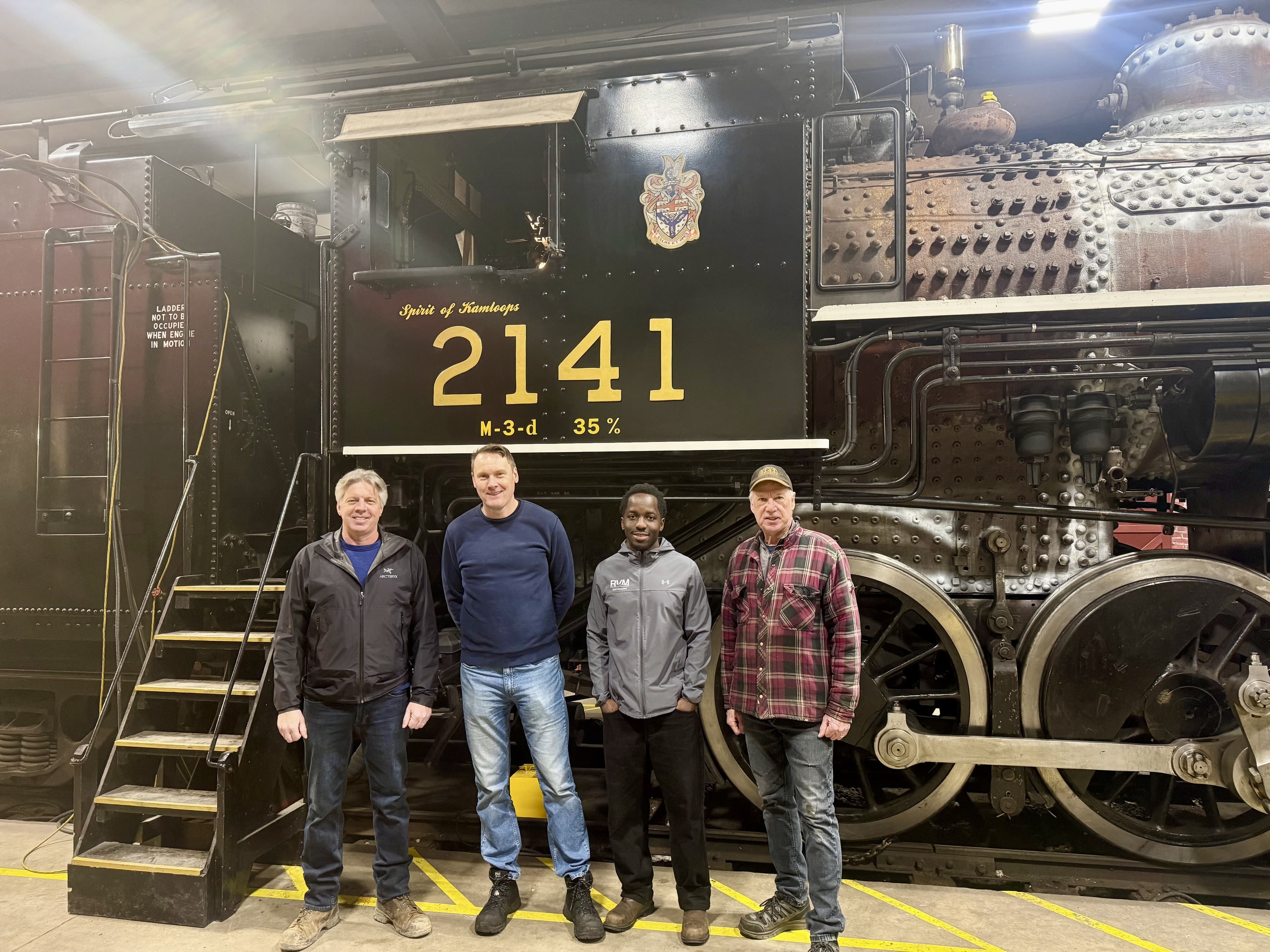Engineering team in front of Locomotive 2141
